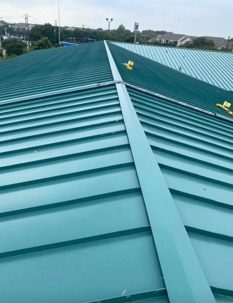 Green commercial metal roof ridge and valley for Metal Roof Repair in Essex